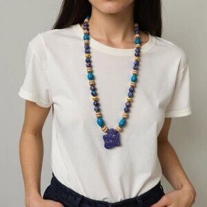 Lunar eclipse. Vibrant turquoise/purple/cream long beaded necklace with a purple
